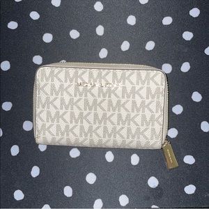 Mini Michael Kors zip up wallet